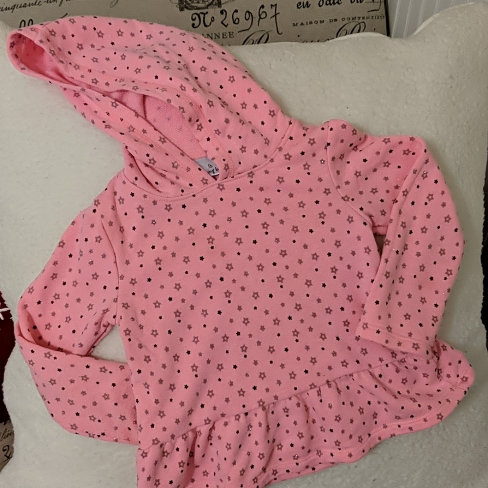 Pink hoodie with silver and black stars